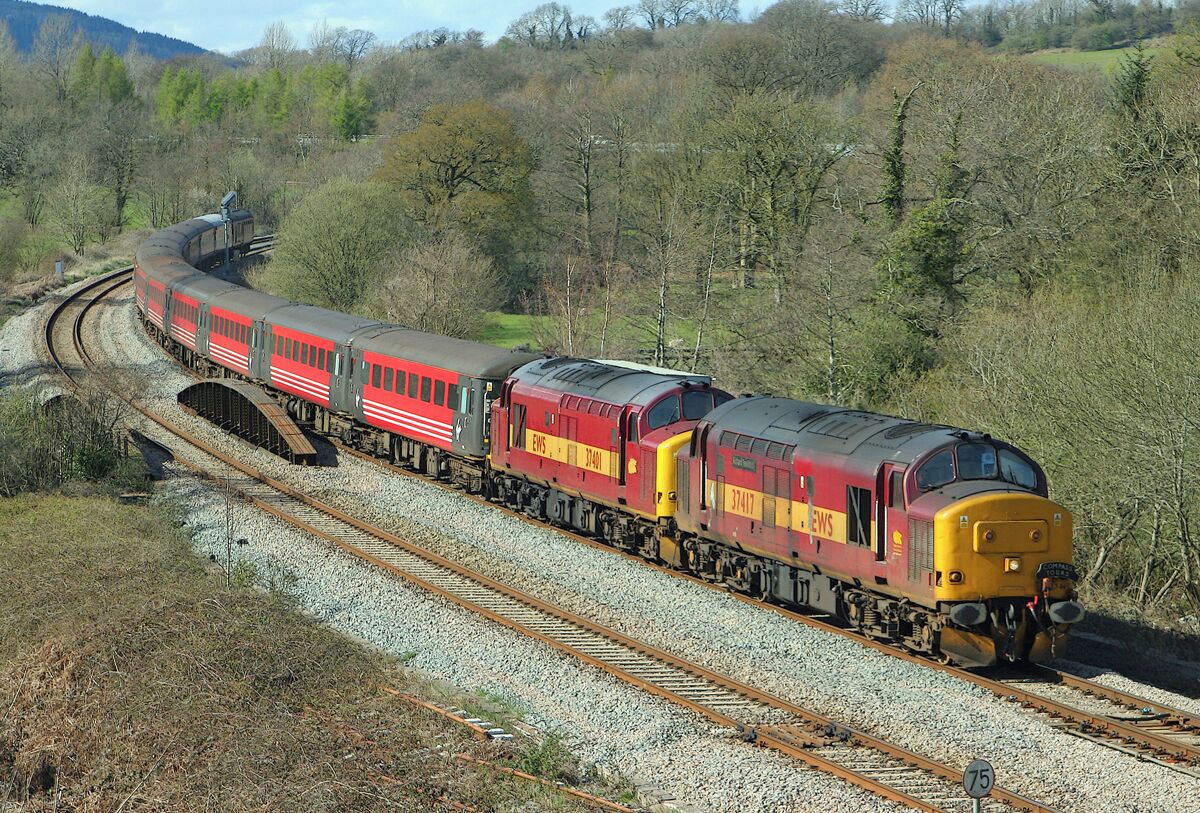 Train near Miskin. A Compass Tours train, double-headed by Class 37s, rounds the curve near Miskin on the South Wales Main Line as it heads for Cardiff/Caerdydd.
