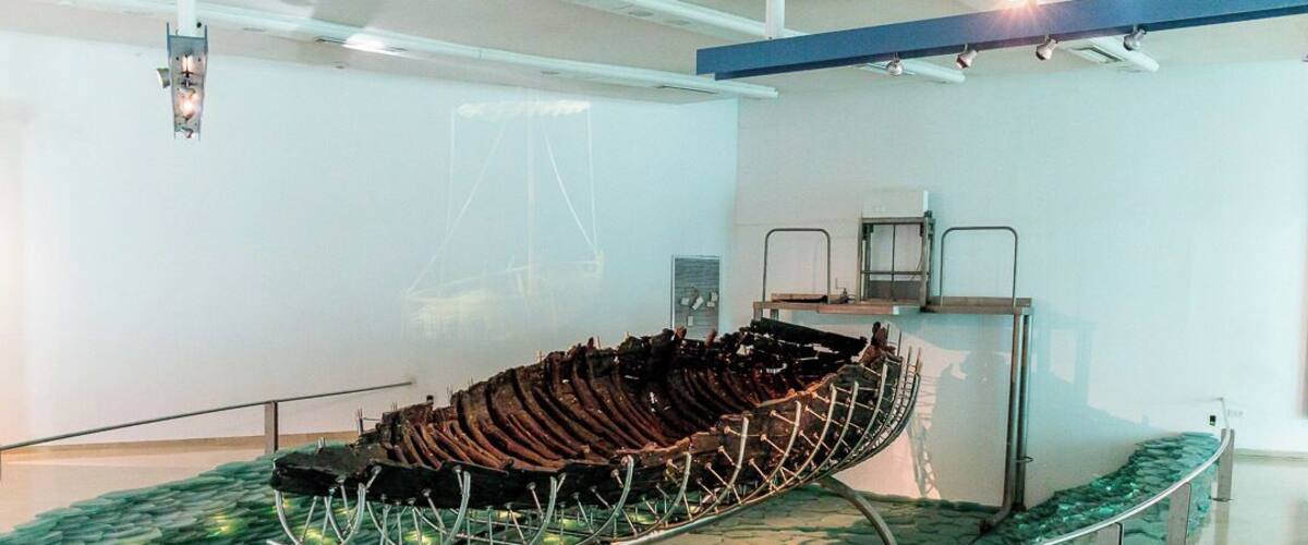 A chocolate boat on display in a museum.