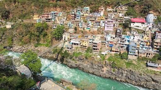 Confluence (""Sangam"") of Alaknanda and Bhagirathi Rivers at Devprayag, within the Tehri Garhwal district of Uttarakhand, India - forming the Ganges River.