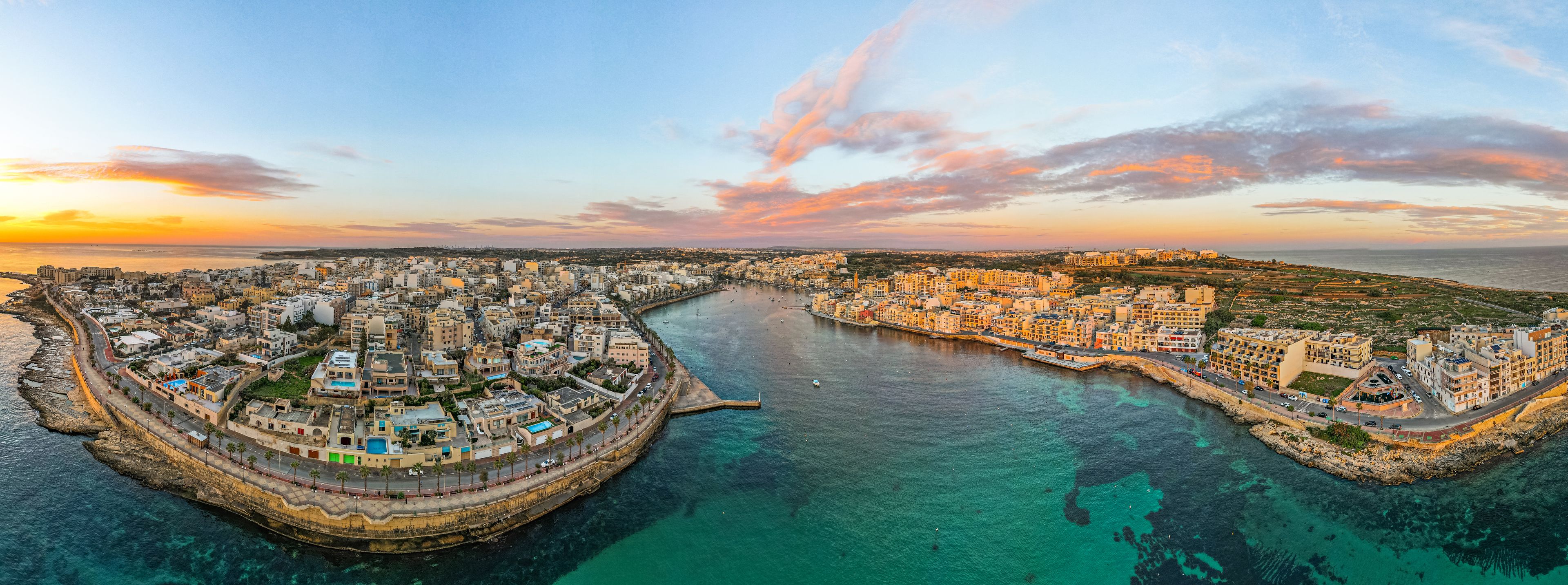 Drone Panorama of Marsaskala at sunrise in Malta