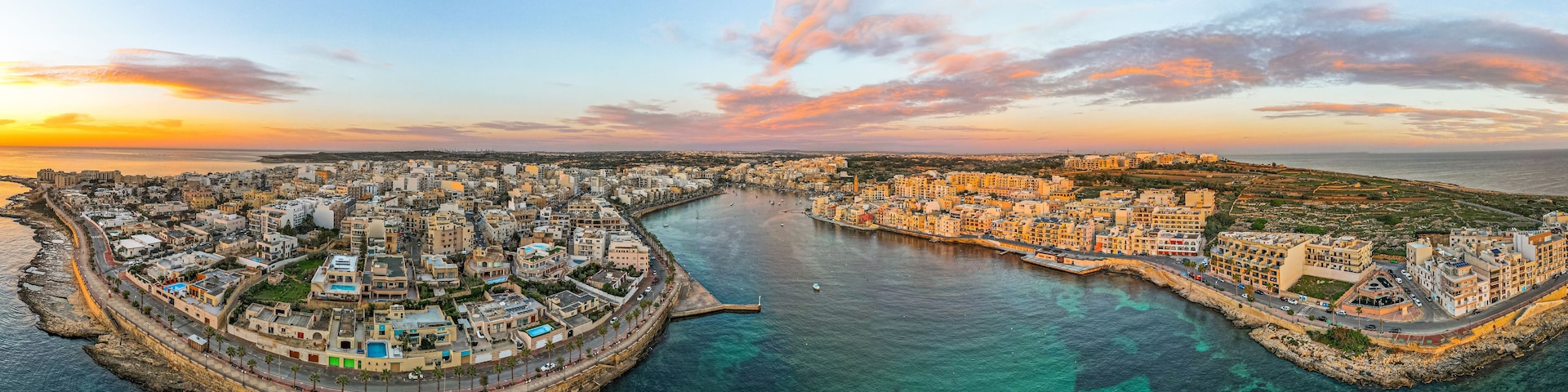 Drone Panorama of Marsaskala at sunrise in Malta