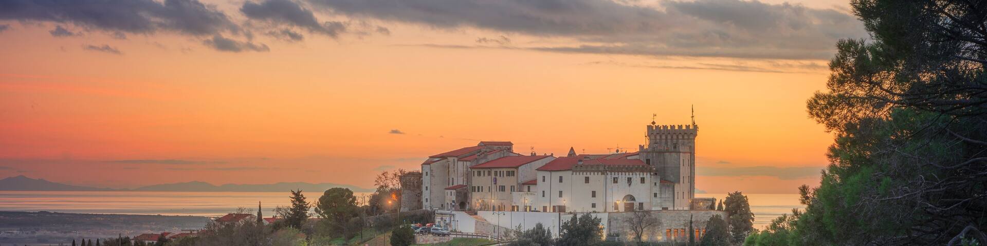 View from above of Rosignano Marittimo and the sea in the background. Tuscany, Italy