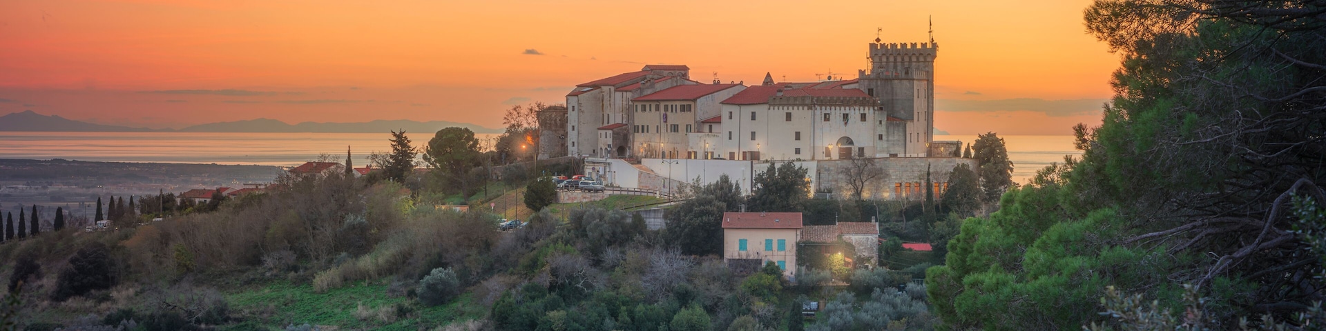 View from above of Rosignano Marittimo and the sea in the background. Tuscany, Italy