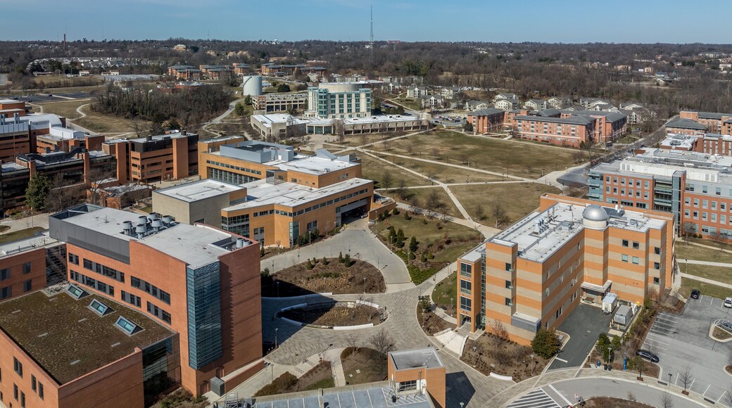 Aerial view of University of Maryland Baltimore County UMBC Catonsville admission office, pool, commons, quad, Honors college, admission office, retriever activities center, kuhn plaza, erickson field