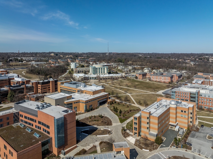 Aerial view of University of Maryland Baltimore County UMBC Catonsville admission office, pool, commons, quad, Honors college, admission office, retriever activities center, kuhn plaza, erickson field
