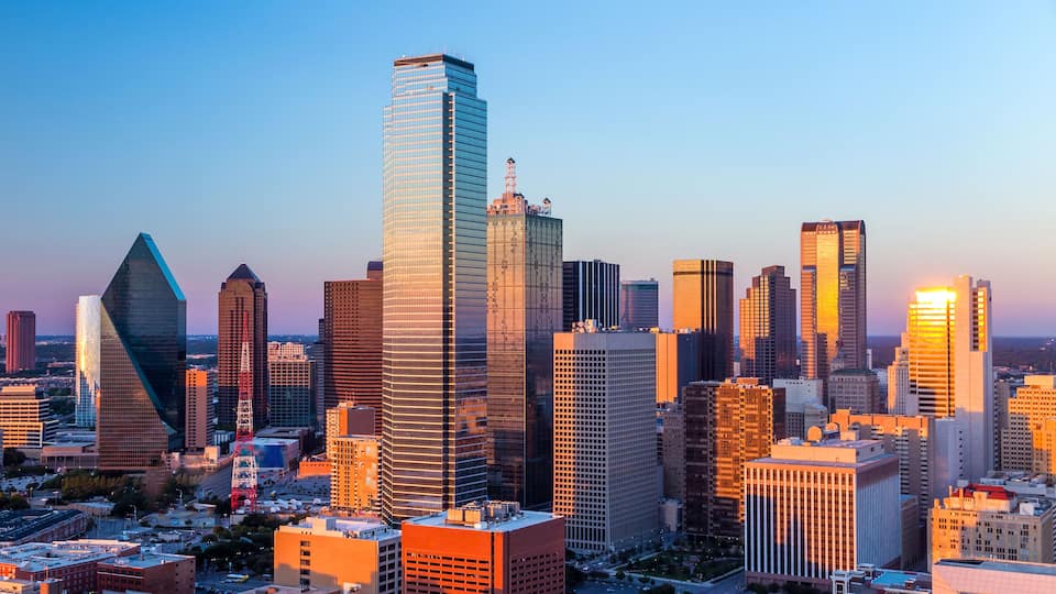 Dallas, Texas cityscape with blue sky at sunset