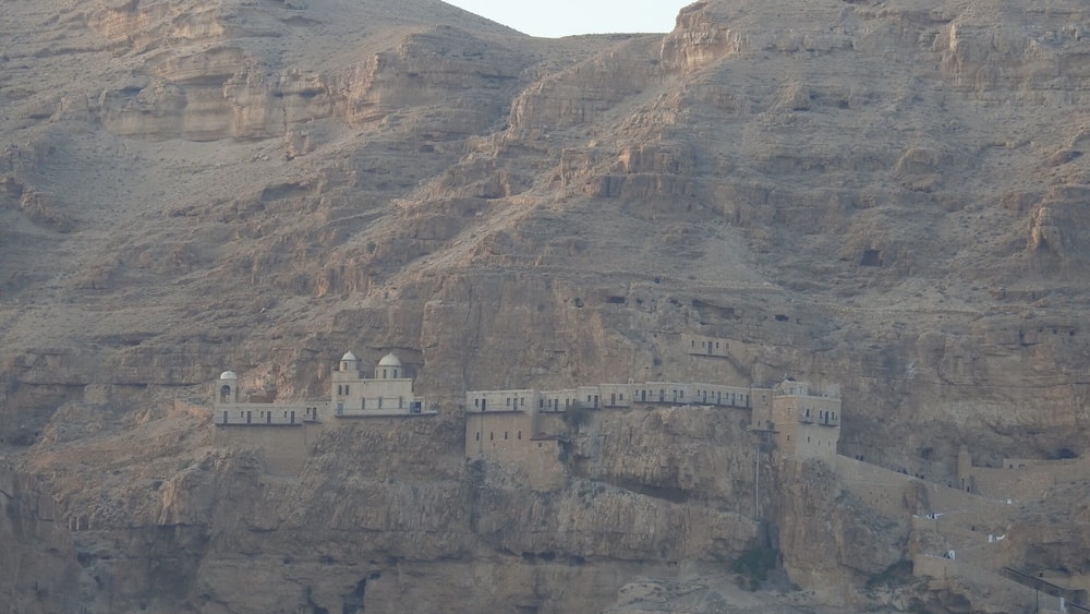A historic fortress built into a rocky hillside.