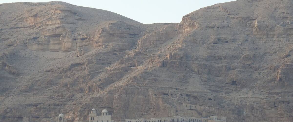 A historic fortress built into a rocky hillside.