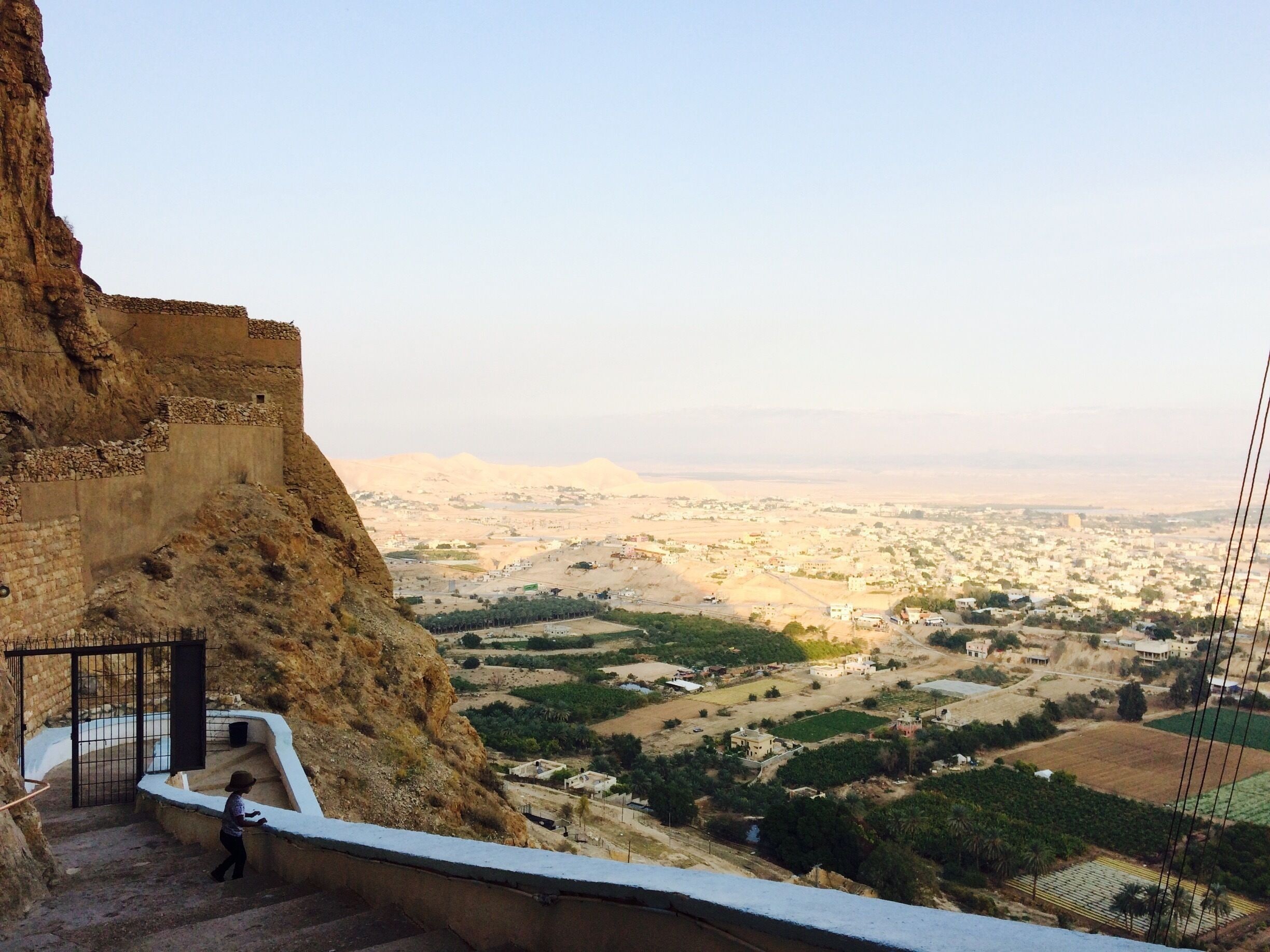 Mini Traveller, enjoying the views halfway up to the Mount of Temptations Monastery, Jericho, Westbank.
