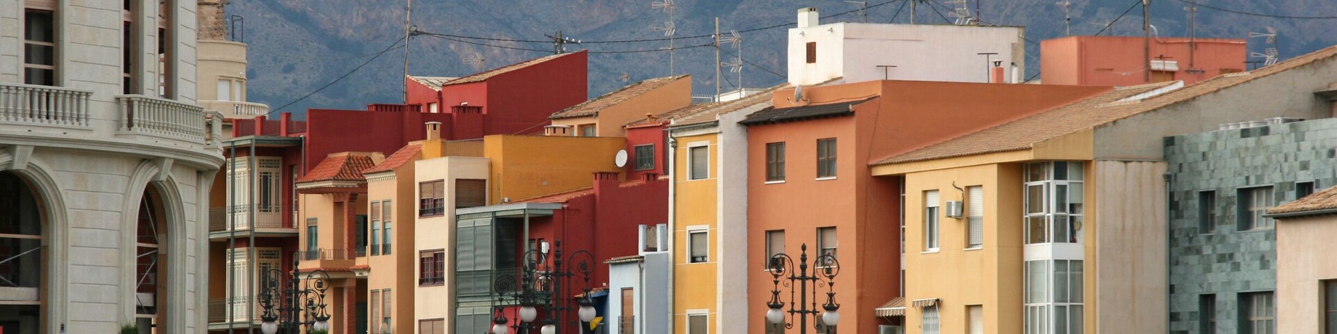 Colorful houses in Orihuela, Spain. Mediterranean architecture.