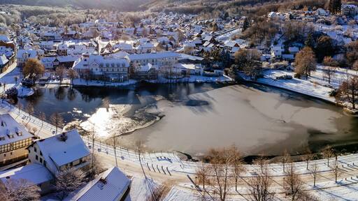 Aerial shot of Ilsenburg in winter on a sunny day in Harz, Saxony-Anhalt,Germany
