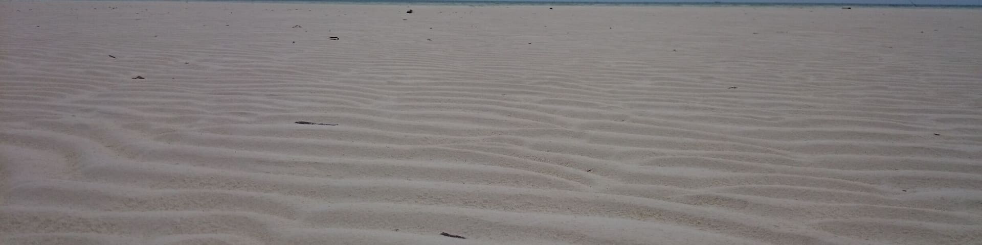 Prestine sand bar in Punta Sebaring - a remote island in Palawan.