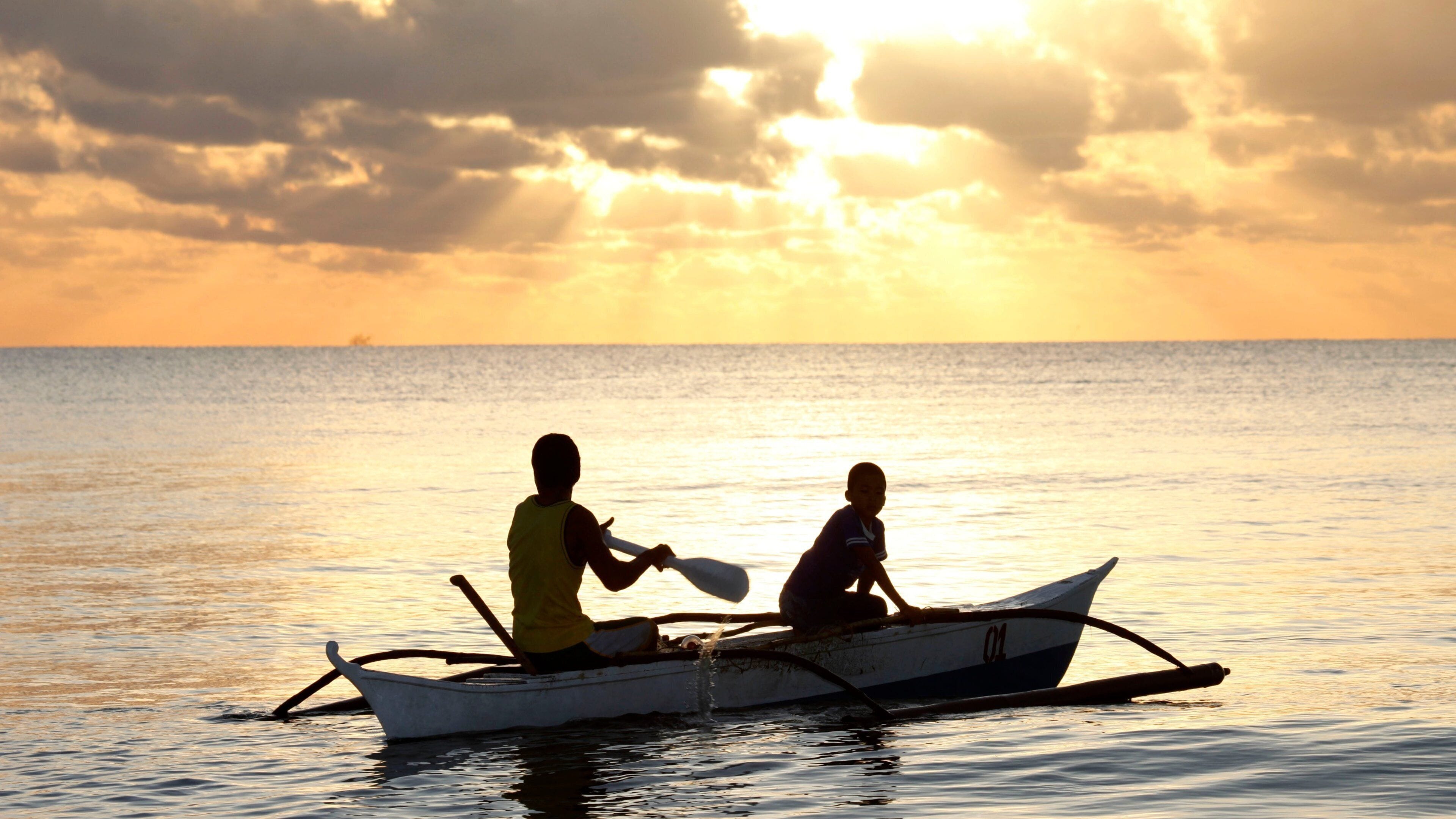 Palawan which includes landscape views, kayaking or canoeing and a sunset