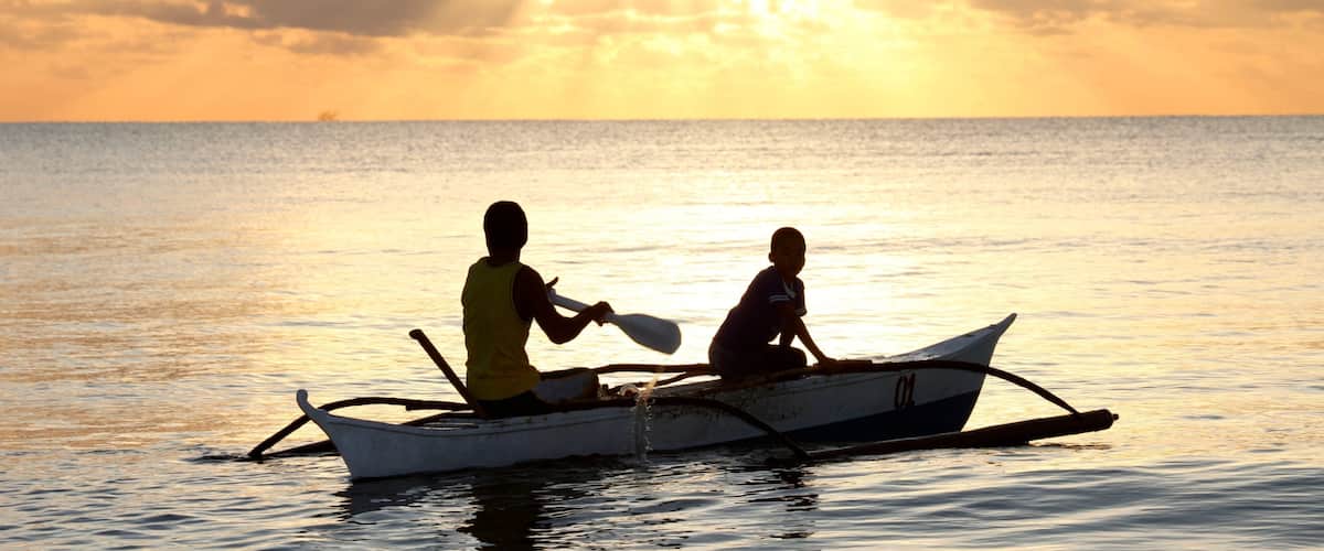 Palawan mettant en vedette kayak ou canoë, coucher de soleil et panoramas