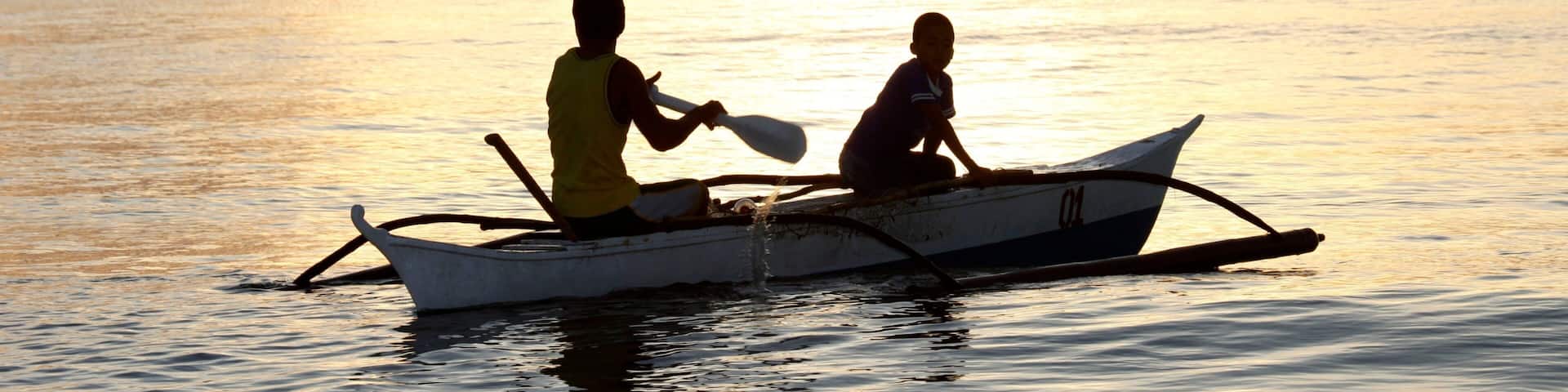 Palawan which includes landscape views, kayaking or canoeing and a sunset