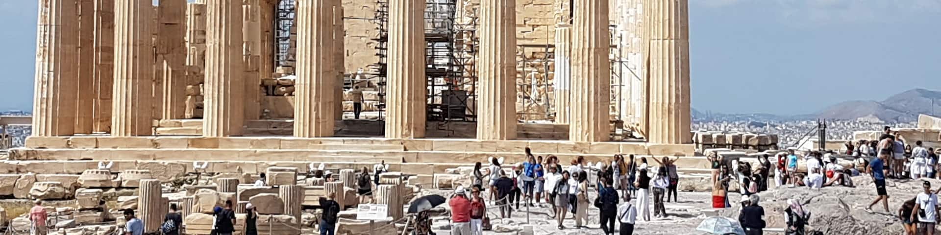 The Parthenon in Athens, Greece, with tourists around it.
