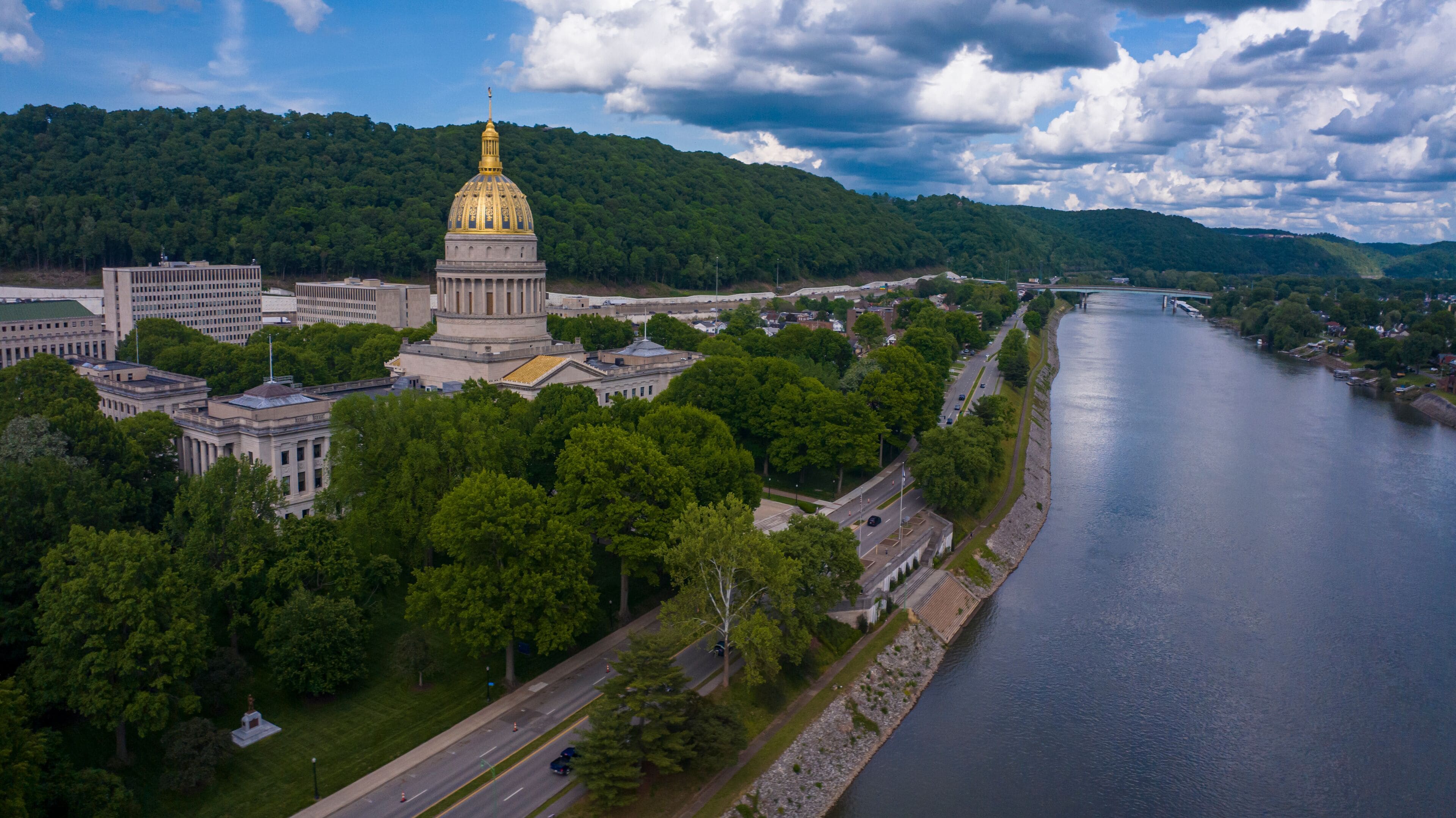 MAY 8, 2023 - CHARLESTON, WEST VIRGINIA, USA - State Capitol of West Virginia features Kanawha River
