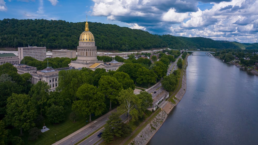 MAY 8, 2023 - CHARLESTON, WEST VIRGINIA, USA - State Capitol of West Virginia features Kanawha River