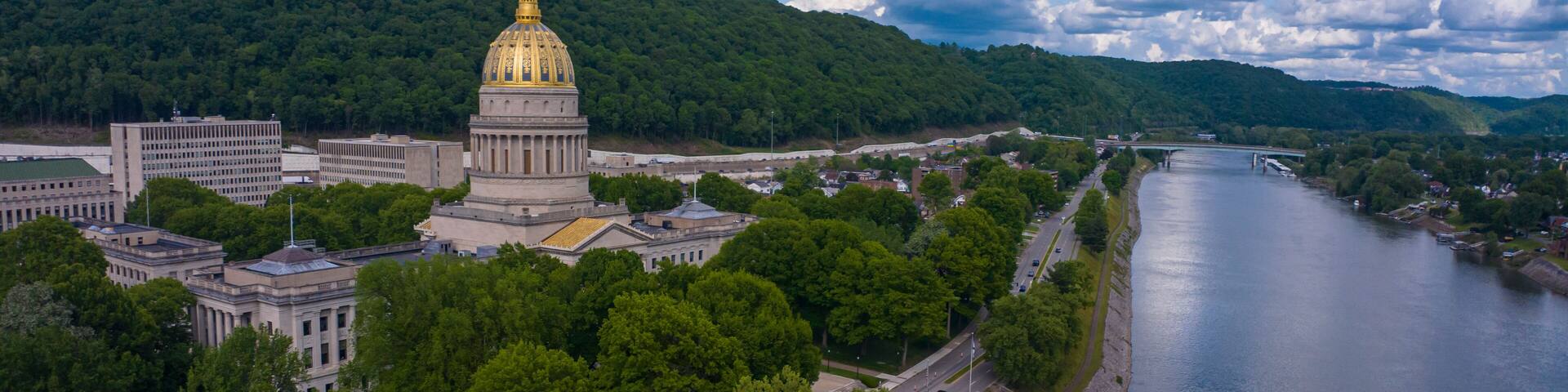 MAY 8, 2023 - CHARLESTON, WEST VIRGINIA, USA - State Capitol of West Virginia features Kanawha River