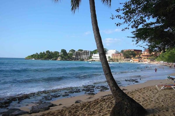 Sousa Beach at Puerto Plata, Dominican Republic. A popular stop on a lot of the organized tours from the resorts. Many vendors everywhere along the beach selling souvenirs.