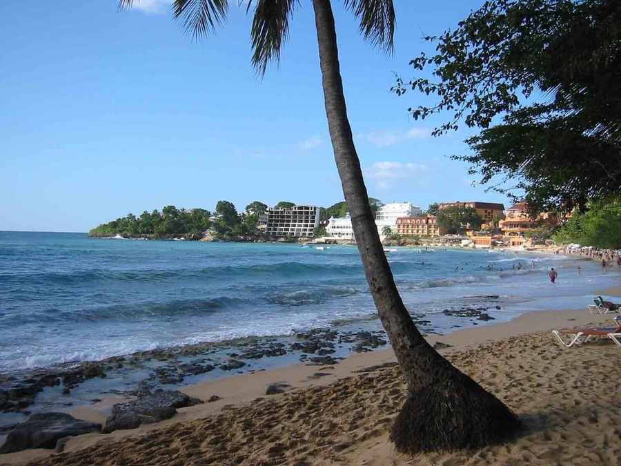 Sousa Beach at Puerto Plata, Dominican Republic. A popular stop on a lot of the organized tours from the resorts. Many vendors everywhere along the beach selling souvenirs.