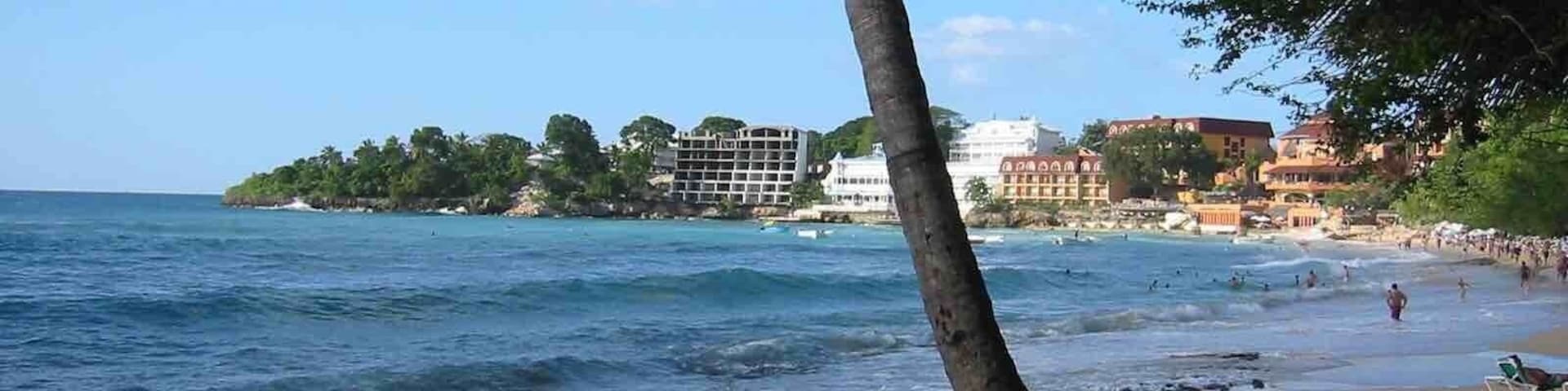Sousa Beach at Puerto Plata, Dominican Republic. A popular stop on a lot of the organized tours from the resorts. Many vendors everywhere along the beach selling souvenirs.