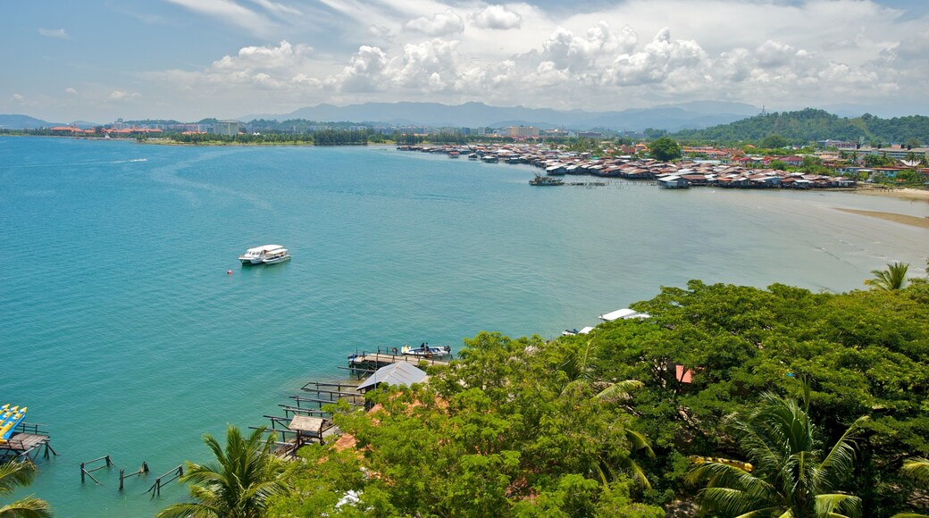 Kota Kinabalu which includes tropical scenes, boating and a bay or harbour