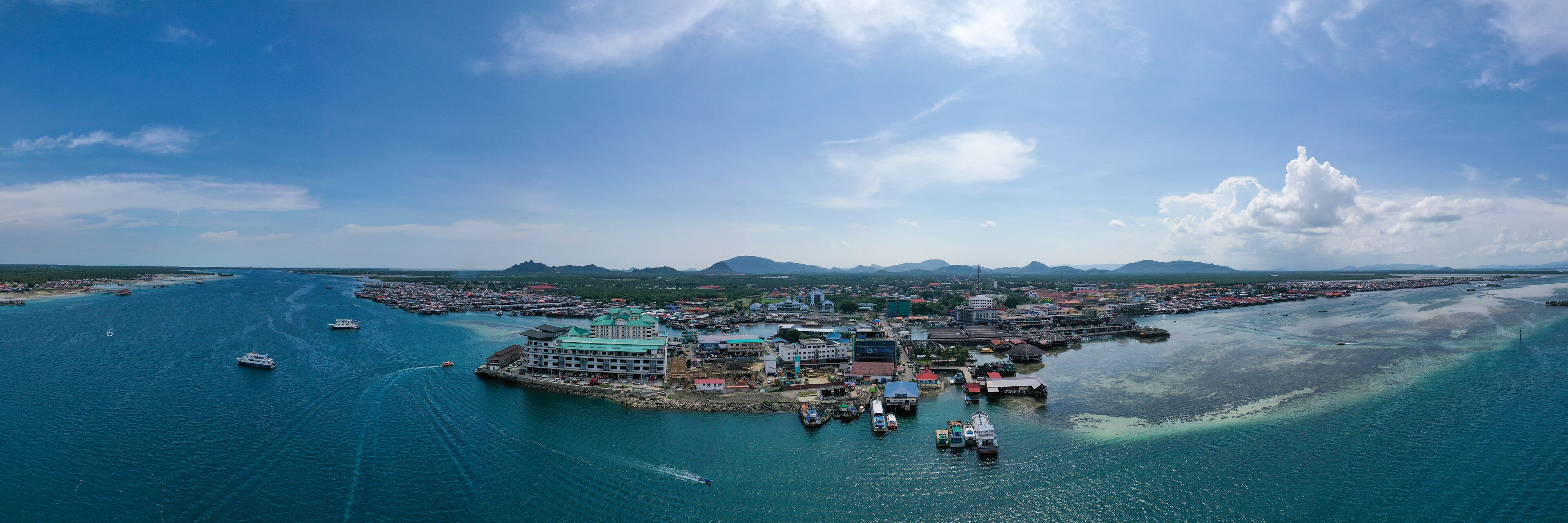 Aerial view partial part of Semporna island with blue ocean and coral reef in Malaysia, Borneo.