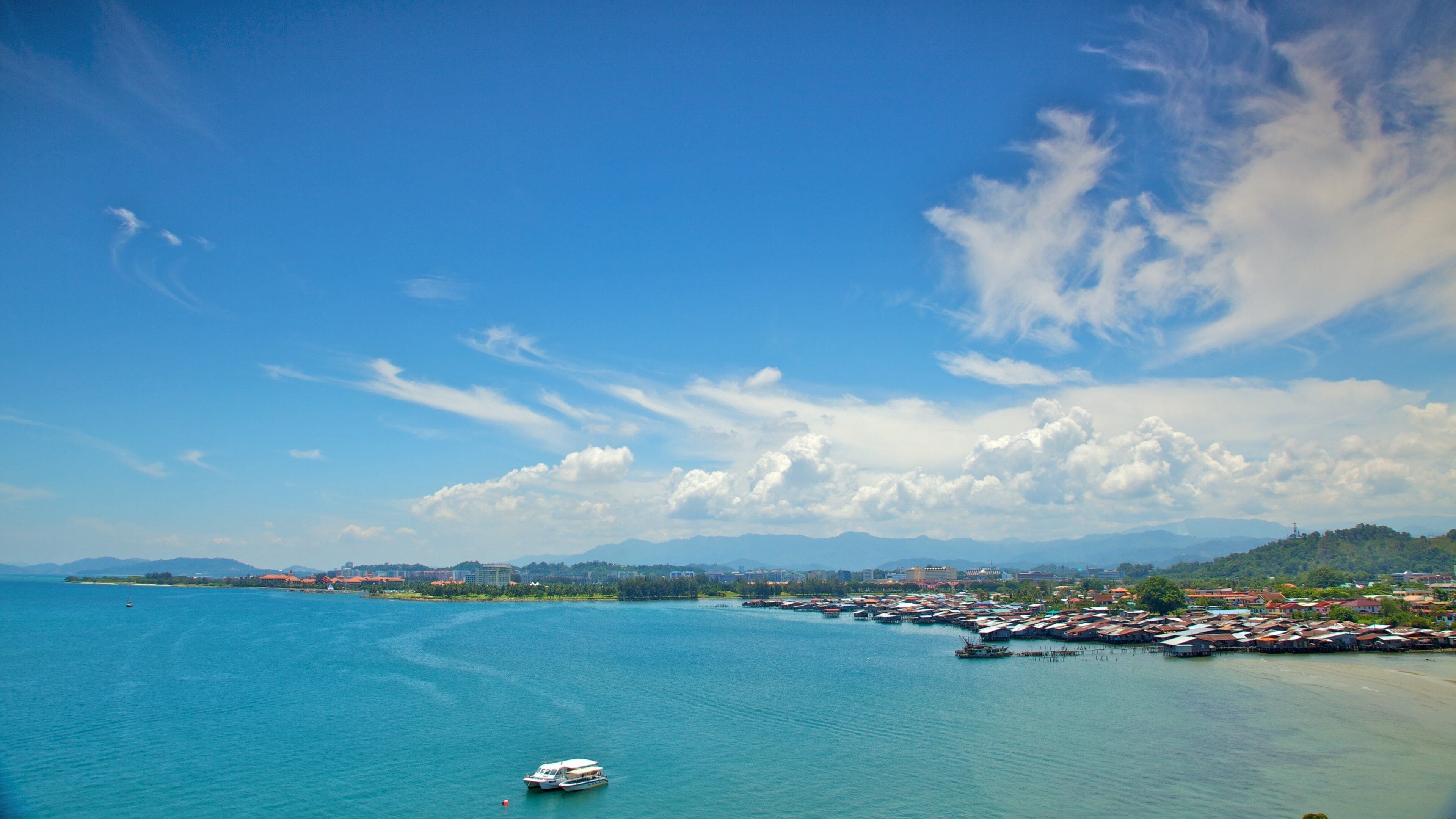 Kota Kinabalu showing a marina, a bay or harbor and a coastal town
