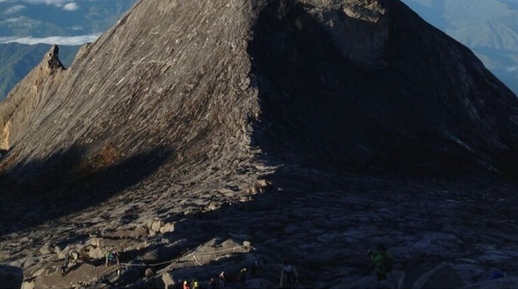 If you into mountain climbing try Gunung Kinabalu. Take the mersilau trail if you want it to be more challenging.