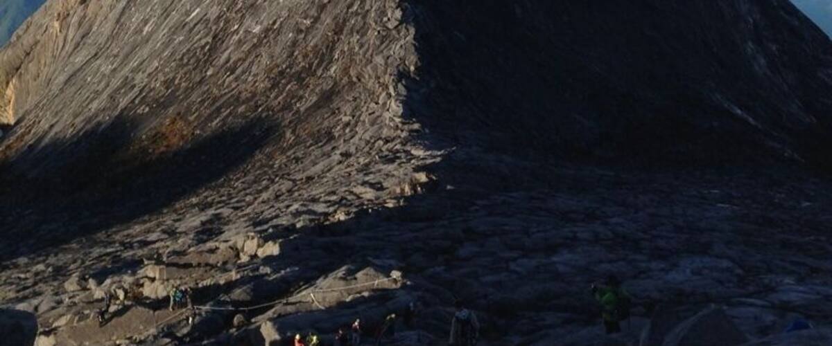 If you into mountain climbing try Gunung Kinabalu. Take the mersilau trail if you want it to be more challenging.