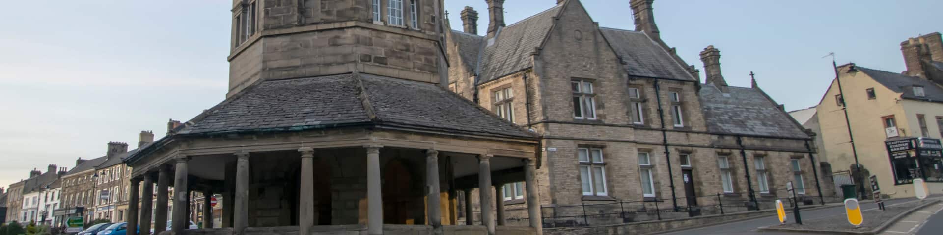 The historic Market Cross in the town of Castle Barnard, County Durham, UK