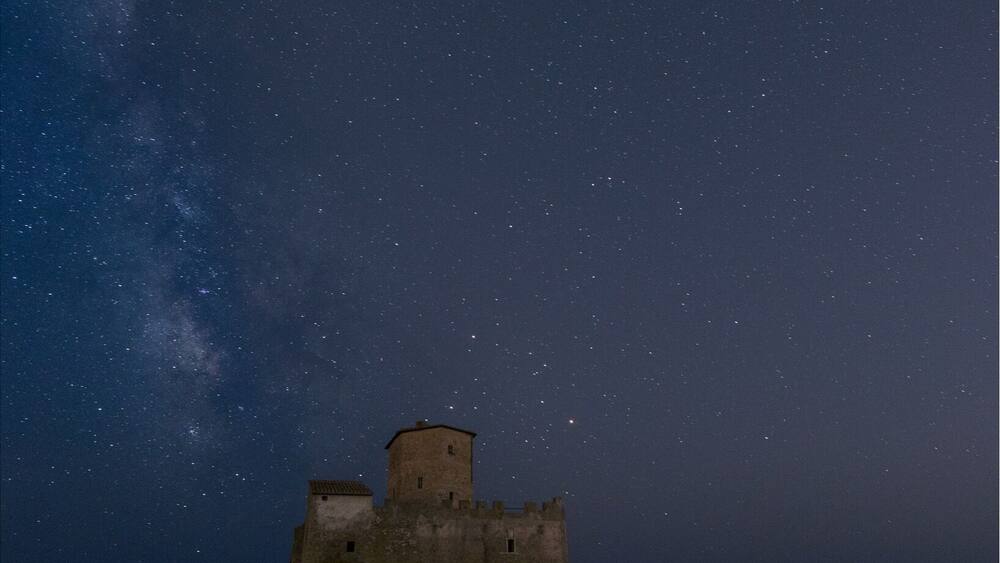 A milk way from torre astura castel on the sea