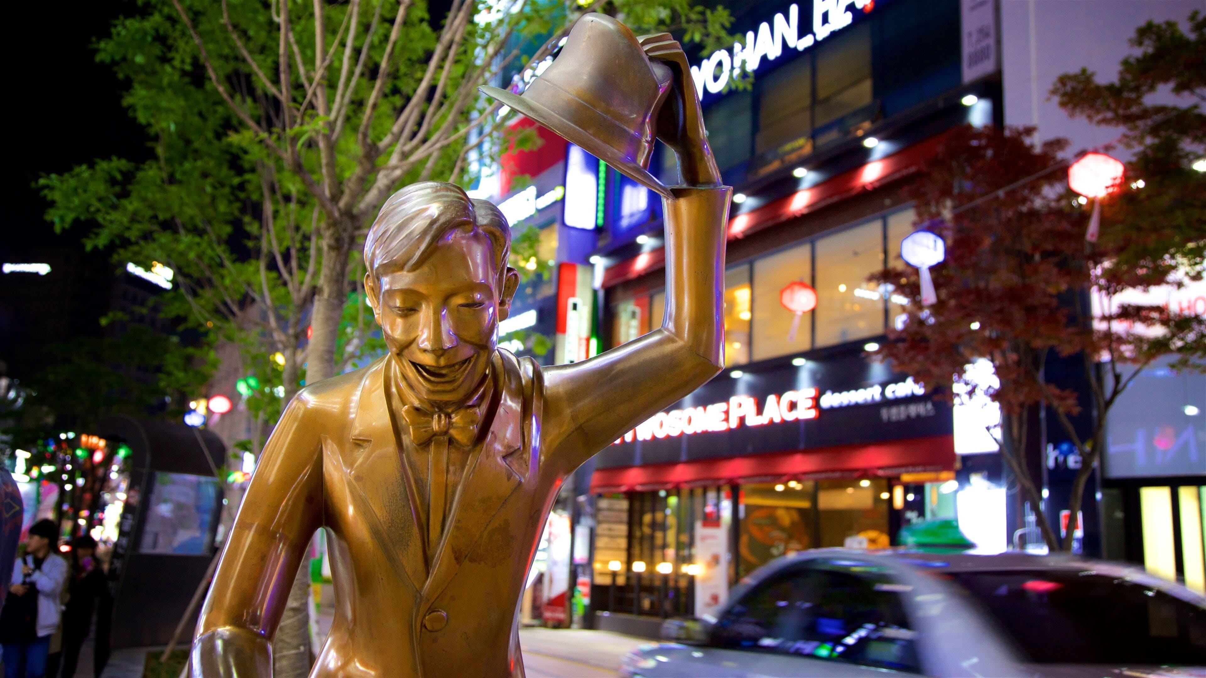 Busan featuring night scenes, signage and central business district