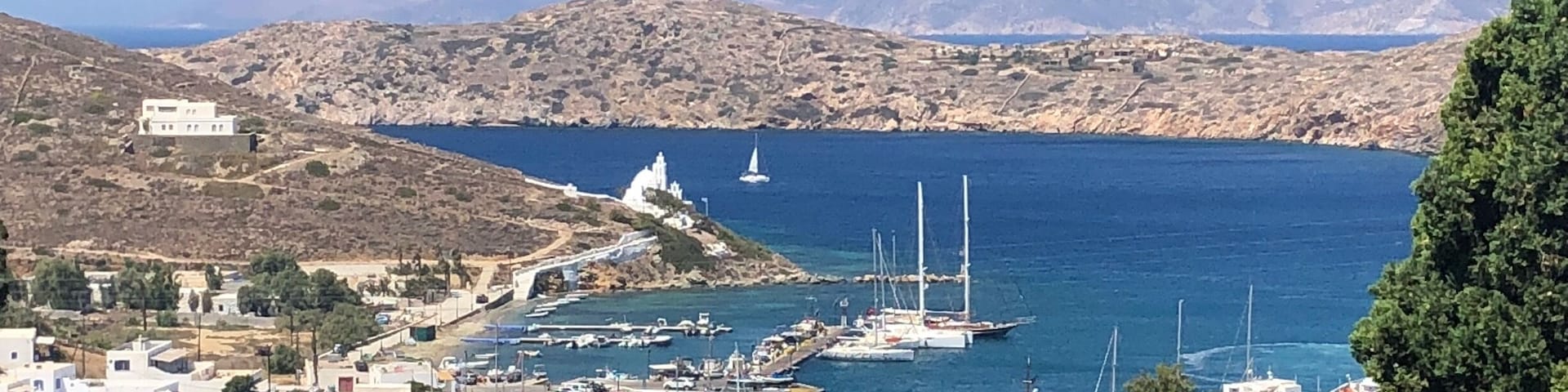 View from the steps on the walk down to port #ios #port #iosport #greece #travels #holidays #europe