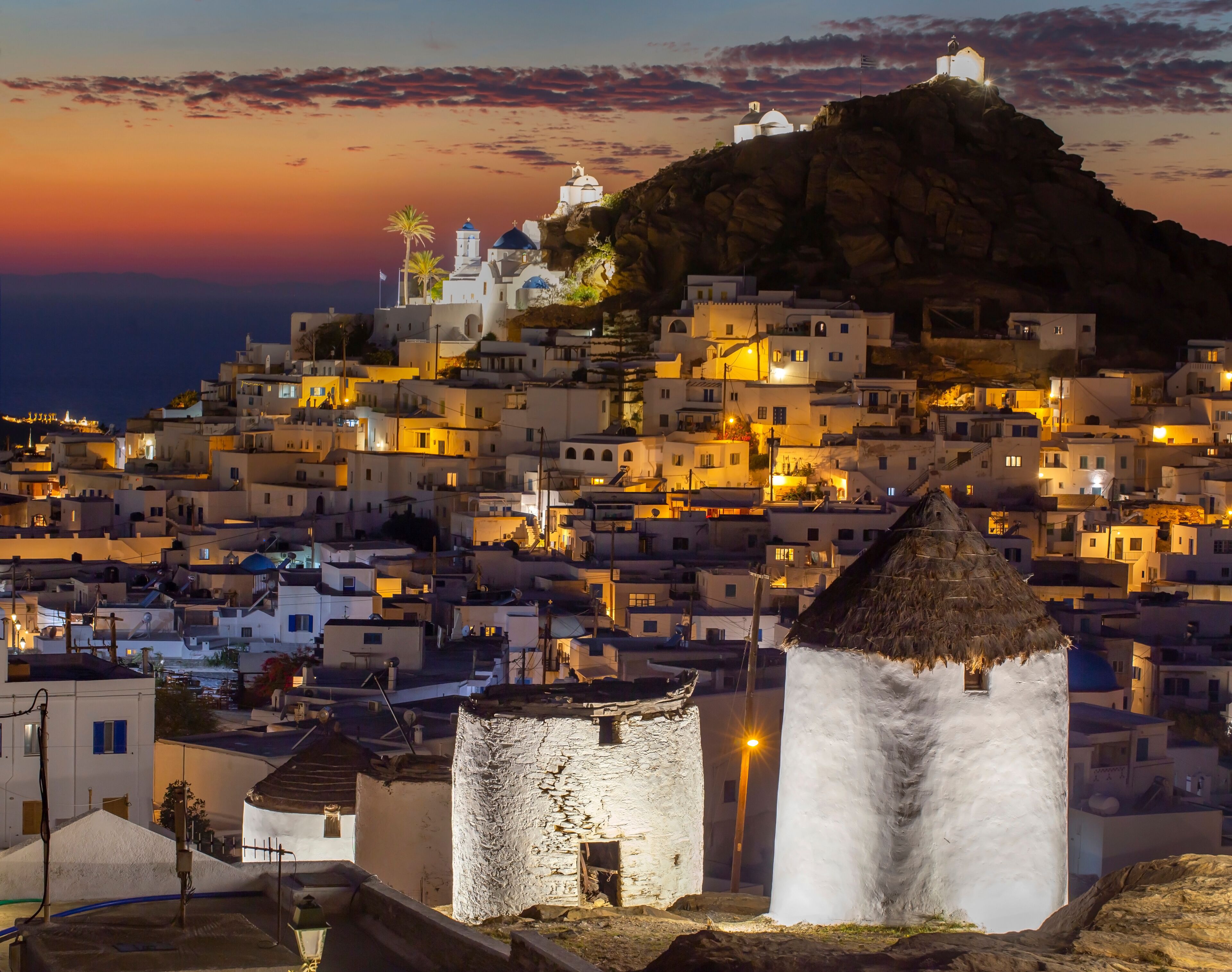 Iconic traditional wind mills in Ios island, Greece.