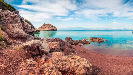 Great spring panorama on the cozy beach in northeastern Corinthia, Greece. Sunny outdoor scene of the Greek resort. Beauty of nature concept background.