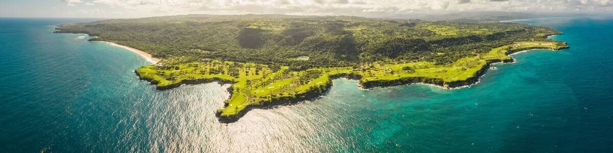Panoramic aerial view of a paradise island in the Atlantic Ocean at sunset. Playa grande beach near Rio San Juan, María Trinidad Sánchez, Dominican Republic.