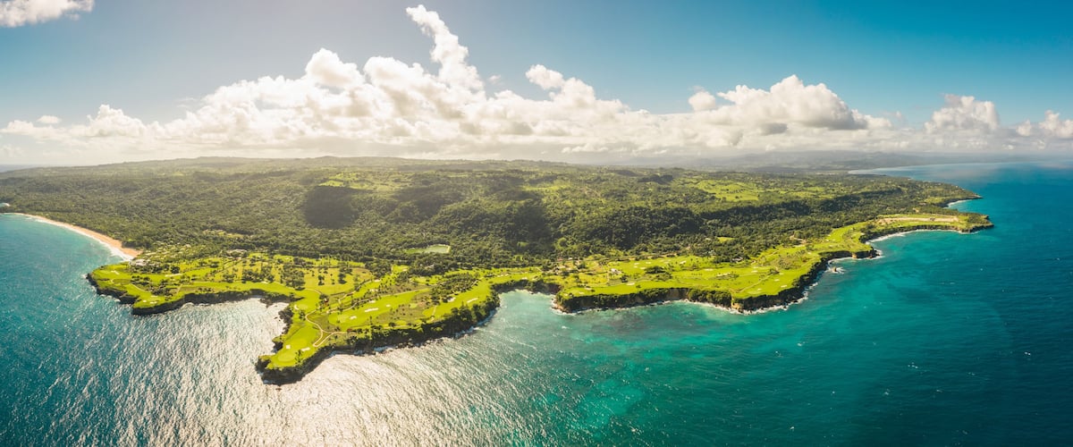 Panoramic aerial view of a paradise island in the Atlantic Ocean at sunset. Playa grande beach near Rio San Juan, María Trinidad Sánchez, Dominican Republic.