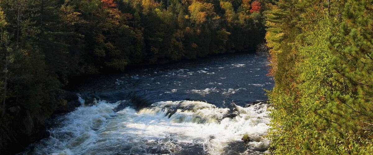 Autumn Color and Rapids on the Menominee River in Piers s Gorge near Norway Michigan