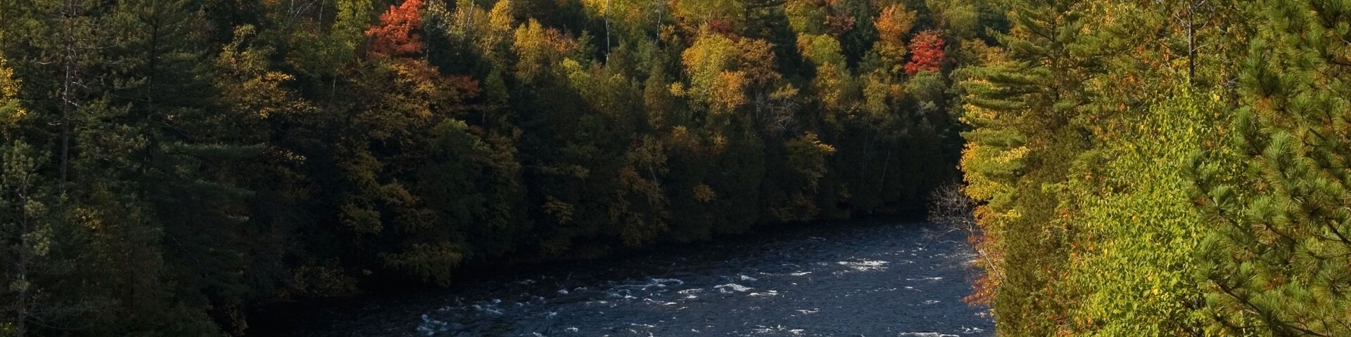 Autumn Color and Rapids on the Menominee River in Piers s Gorge near Norway Michigan