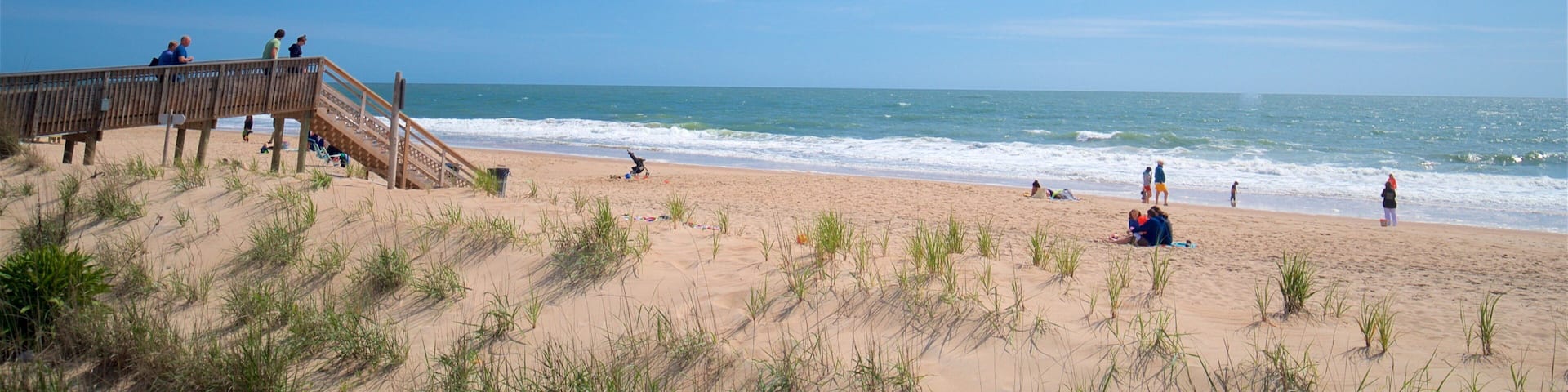 Bethany Beach featuring general coastal views and a beach as well as a small group of people