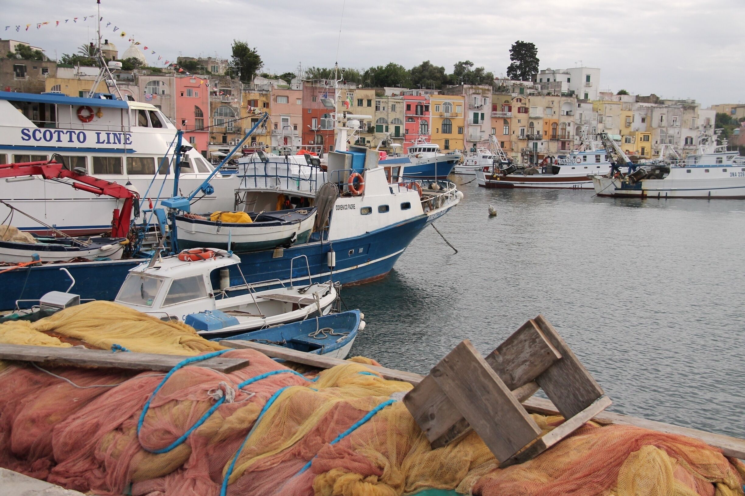 Procida is certainly the quietest Island of Napoli's bay. But certainly the most authentic. If you stay overnight you could see the fisherman repairing their nets for the next days. Very colorful, Procida deserves to be discovered walking and taking your time to really appreciate its beauty