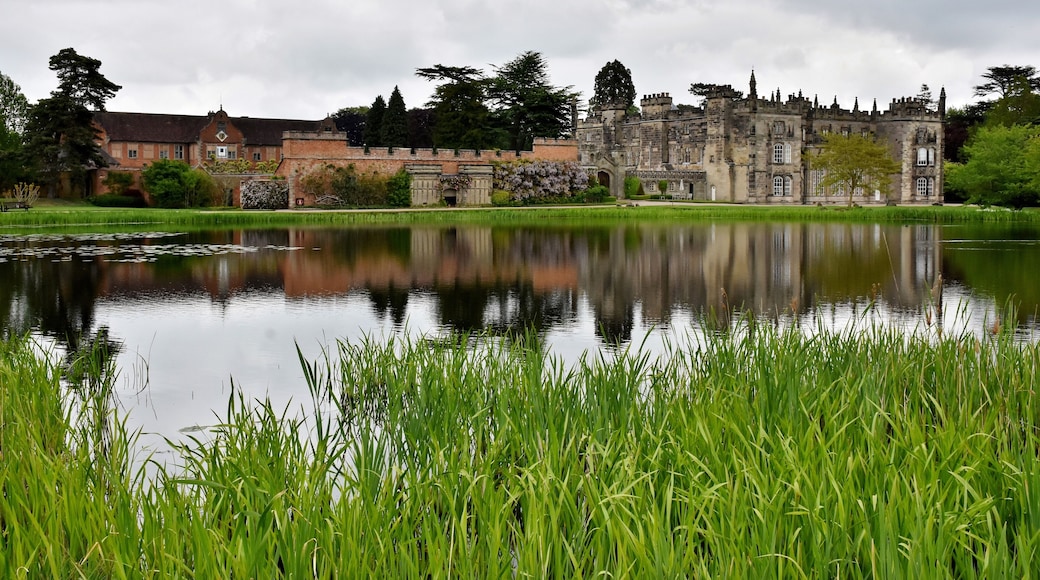 The hall is built on the site of the former Arbury Priory in a mixture of Tudor and 18th-century Gothic Revival architecture, the latter being the work of Sir Roger Newdigate from designs by Henry Keene.
