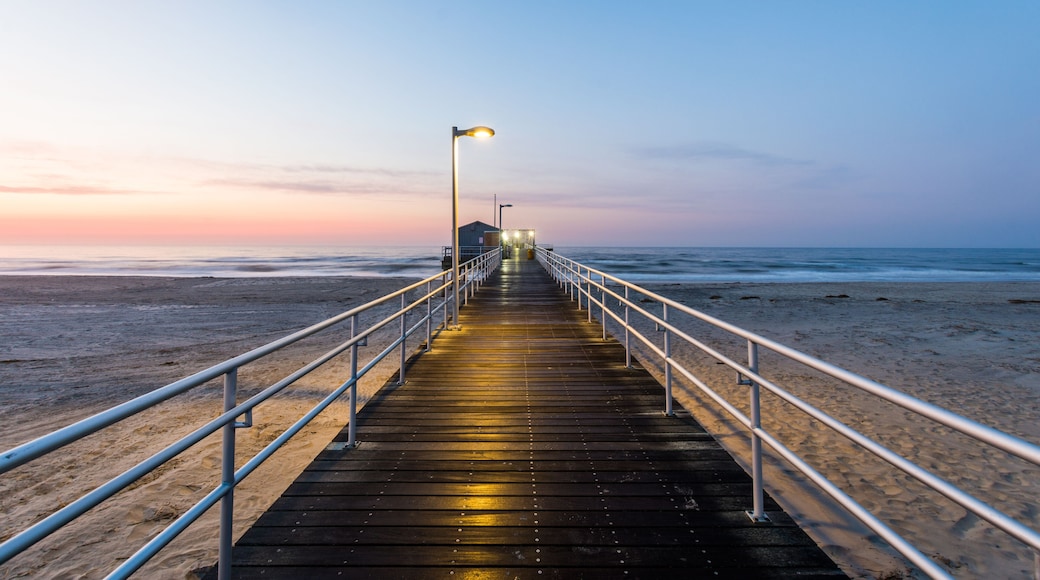 Fishing Pier in ventnor city beach in atlantic city, new jersey at sunrise