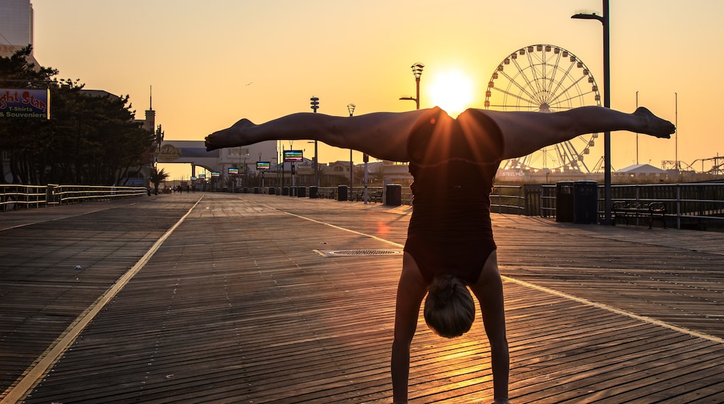 Handstands on the boardwalk by Atlantic City ferris wheel