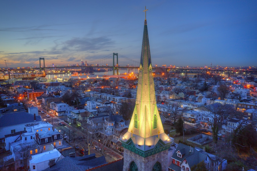 Aerial View of Church Steeple in Riverfront Community