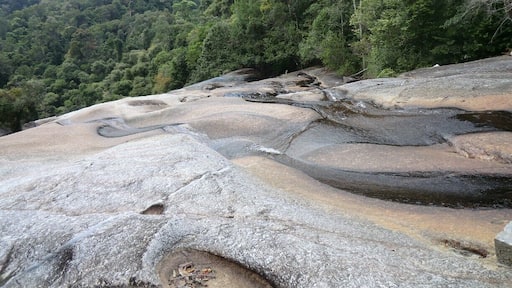 Telaga Tujuh or Seven Wells. We rented a scooter en we took it Island hopping. The seven wells is a great stop.