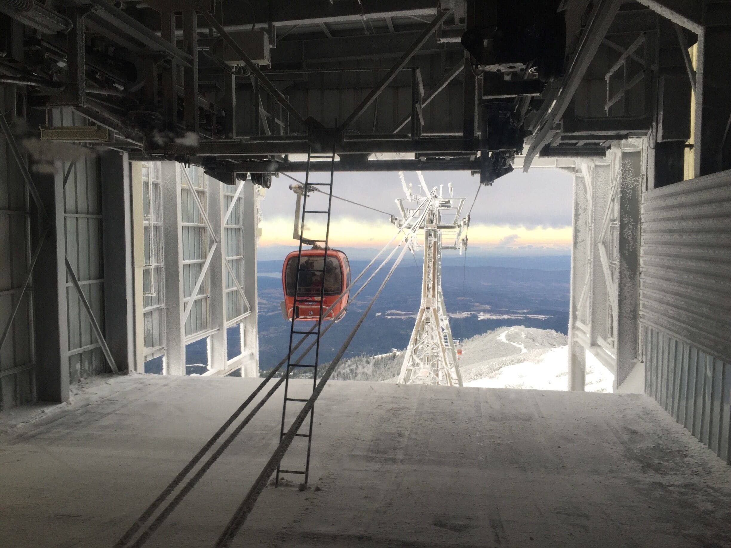 Frozen lift and cable cars moving from the speed of the wind. A window to the world below. Get the cable car all the way to the top to enjoy the view #WinterWonders #lifeatexpedia