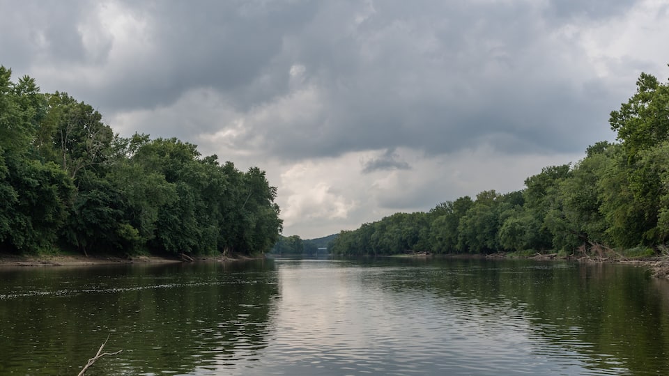 Scenic Wabash river vista in the summer set against dramatic sky, central Indiana
